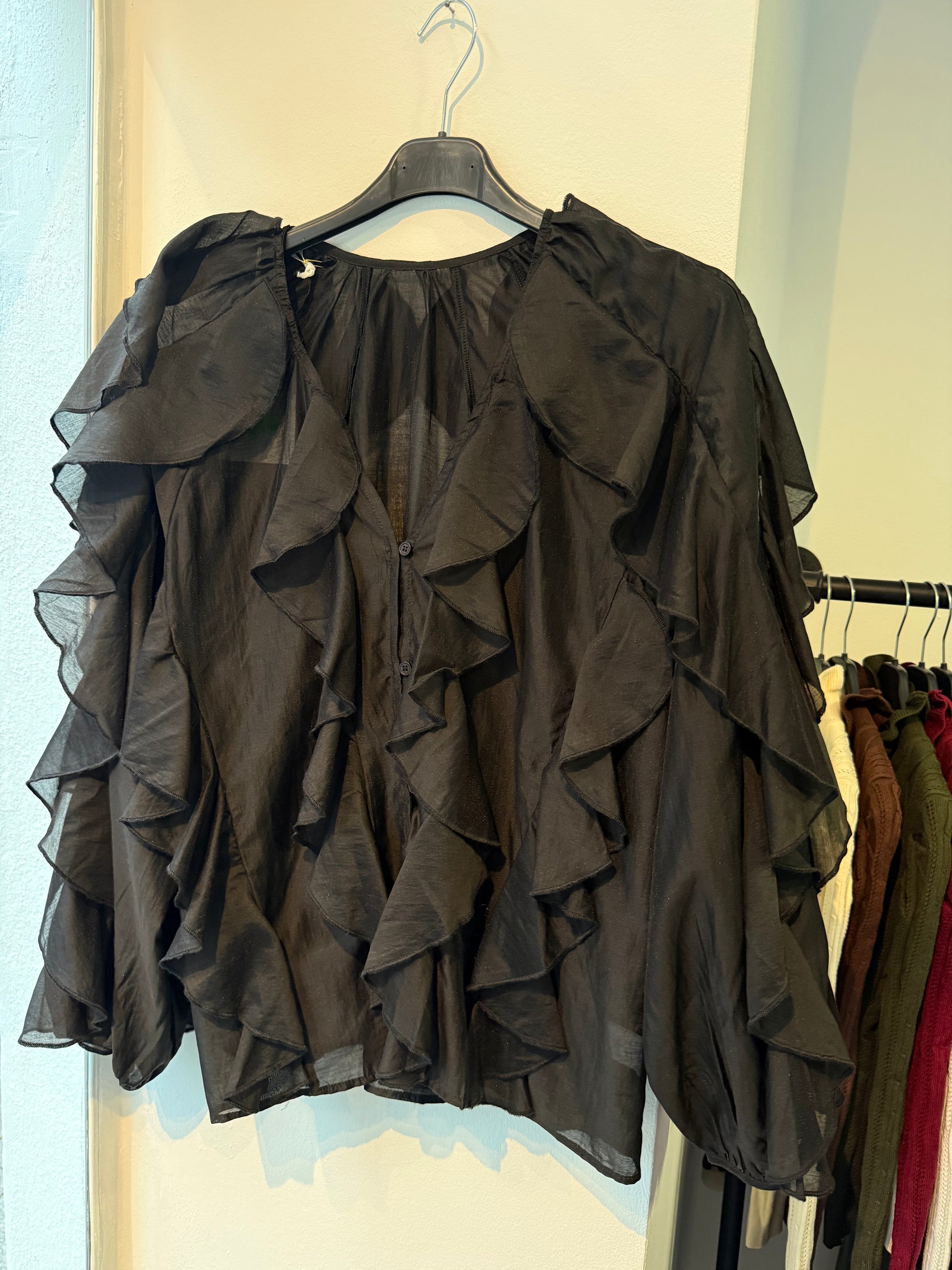 ruffled blouse