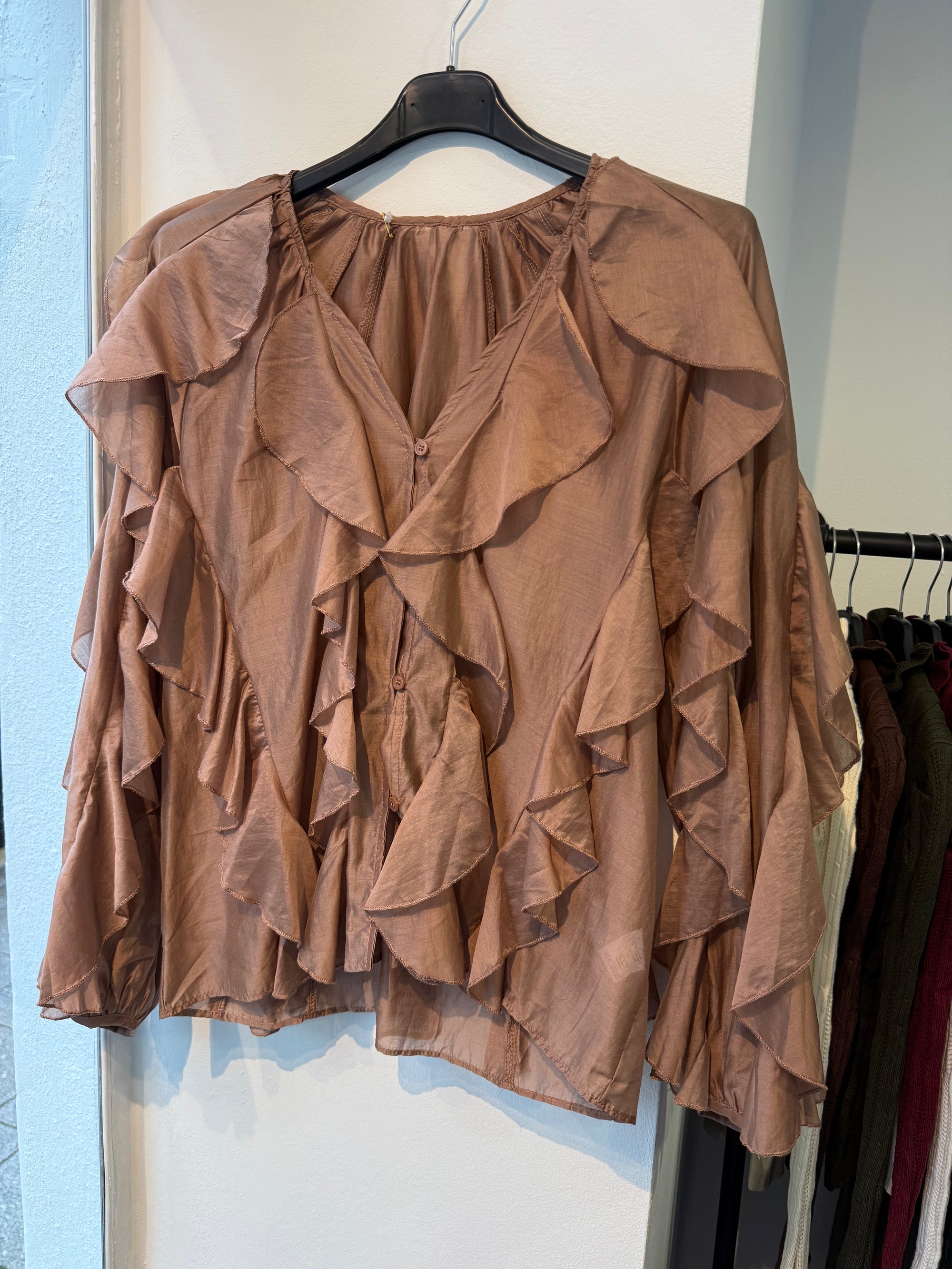 ruffled blouse